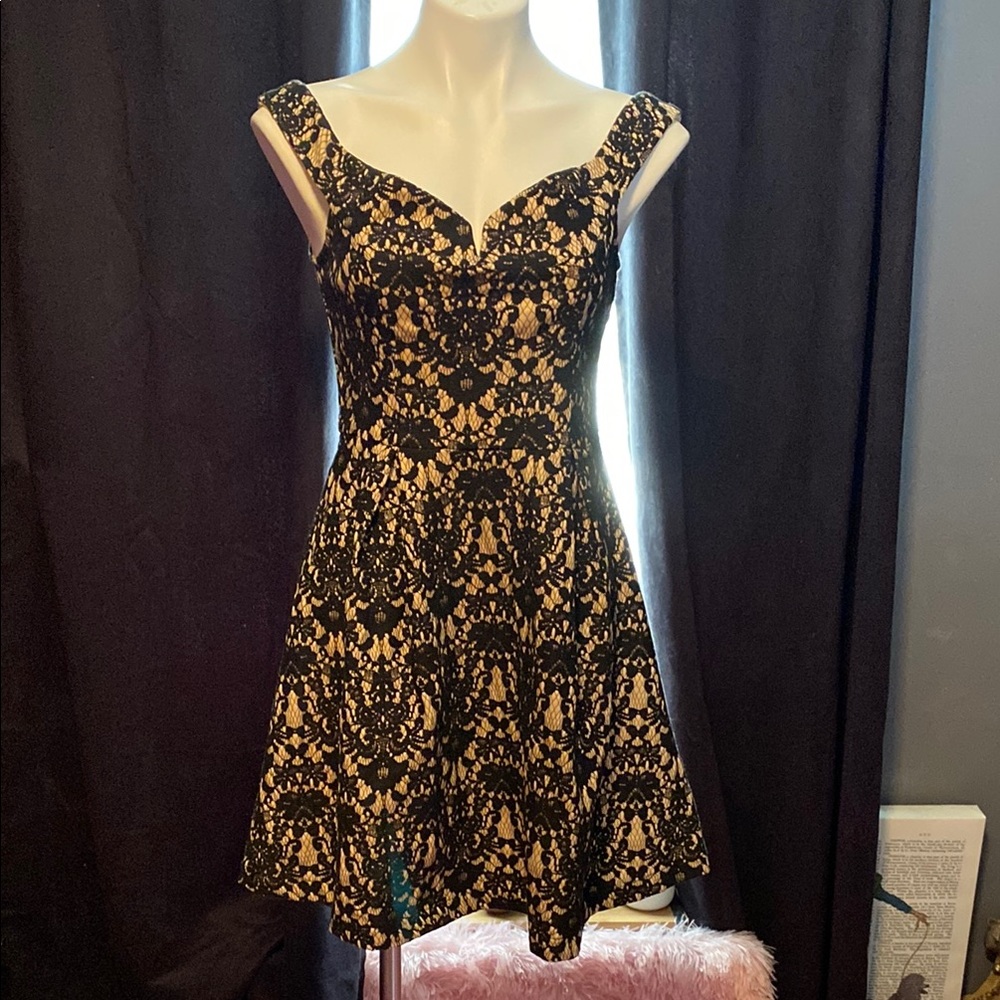 Fit and flare black lace over nude liner sweetheart neckline night out dress